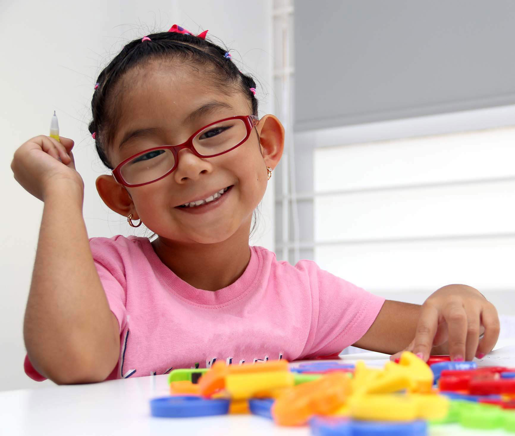 little girl doing evaluation testing